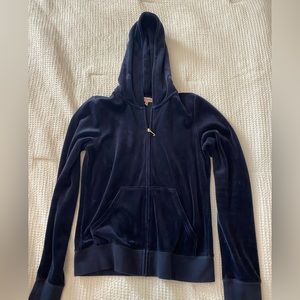 Juicy Couture “tracksuit” not sure if authentic navy blue with crown on back.